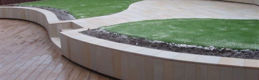 Example Landscaping with Designer Paving & Wall by LCM CONSTRUCTION